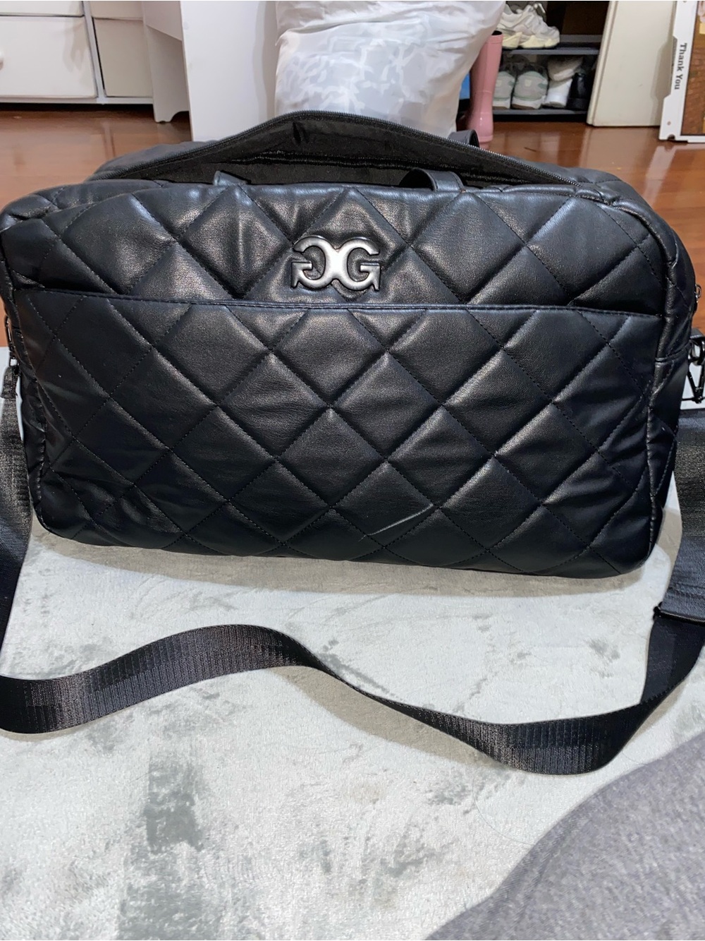 Black Quilted Messenger Bag with Silver Double-G Accent
